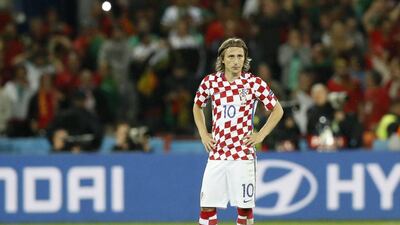 Croatia’s Luka Modric reacts after Portugal’s Ricardo Quaresma scores their decisive goal. Carl Recine / Reuters