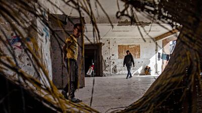 Displaced Syrians living in war-damaged buildings in the rebel-held northern city of Raqqa. AFP
