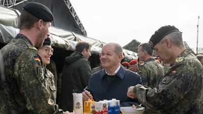Mr Scholz while visiting the Bundeswehr army training centre in Ostenholz in October. Getty Images