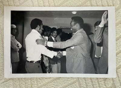 Rajab Abdulrahman meets Brazilian superstar Pele during his visit to Abu Dhabi for the Gulf Cup in 1982. Antonie Robertson / The National