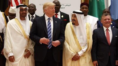 Saudi King Salman and US president Donald Trump pose for photos with Sheikh Mohammed bin Zayed, Crown Prince of Abu Dhabi and Deputy Supreme Commander of the Armed Forces, King Abdullah II of Jordan and other leaders attending the Arab Islamic American Summit in Riyadh on May 21, 2017. Evan Vucci / AP Photo