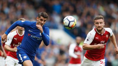 Chelsea's Alvaro Morata, left, and Arsenal's Shkodran Mustafi vie for the ball. Frank Augstein / AP Photo
