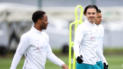 ack Grealish and Raheem Sterling train on Tuesday. Reuters