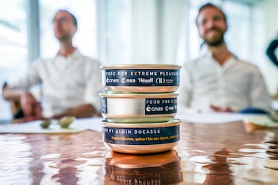 Tins of 'space food' are presented at the Orbite Astronaut Orientation course. Photo: Magali Maricot / Orbite