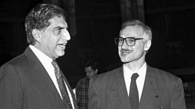 Mr Tata speaks to fellow industrialist Jamshed Godrej in Kolkata in 1995. AP