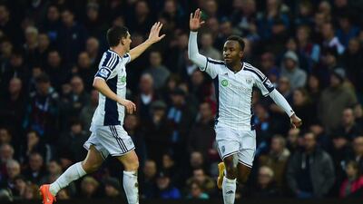 Saido Berahino of West Bromwich Albion, right, celebrates with teammate Graham Dorrans after scoring the equaliser in a 1-1 draw with West Ham United on Thursday at Upton Park. Jamie McDonald / Getty Images