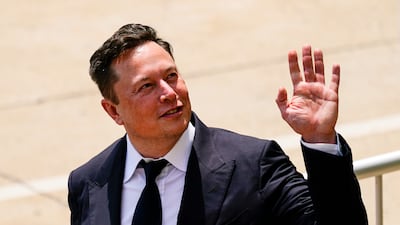 Tesla employed about 100,000 people at the end of 2021. AP