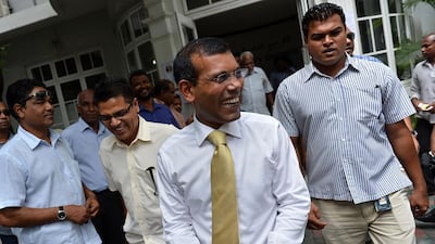 Former Maldivian president and presidential candidate Mohamed Nasheed (centre) won the first round in his bid to return to power after being toppled 21 months ago. Ishara Kodikara / AFP