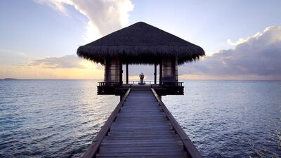 Guests at the One&Only Reethi Rah can have a private yoga class in the stunning Chi Pavilion. Courtesy One&Only Reethi Rah
