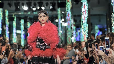 Models walk up and down the catwalk during the Dolce & Gabbana Fashion Show at Dubai Mall.