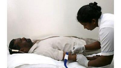 Until medical professionals get more respect, readers say, the health-care crisis will continue. Pawan Singh / The National