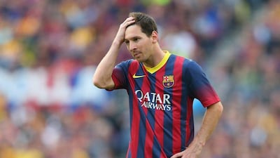 Lionel Messi of FC Barcelona looks dejected during the Saturday's draw with Atletico Madrid that cost Barca the La Liga title. Alex Livesey / Getty Images / May 17, 2014
