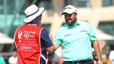 Shane Lowry and caddie Brian Martin after completing the first round at the 2019 Abu Dhabi HSBC Championship presented by EGA. Getty Images