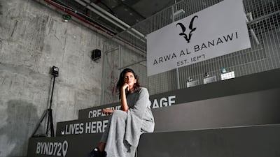 Arwa Al Banawi’s latest collection features relaxed abaya-inspired dresses made from sporty grey knits. Chris Whiteoak / The National