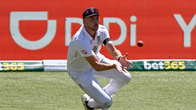 England's Josh Tongue takes a catch to dismiss Australia batter Usman Khawaja. AFP