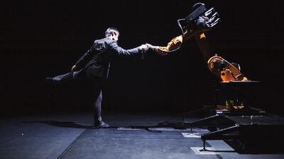 Huang Yi rehearses with robot Kuka, which has become like an extension of the Taiwanese choreographer. Photo by Jacob Blickenstaff