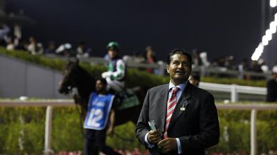 Satish Seemar is the trainer for Surfer. Jeffrey E Biteng / The National