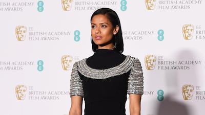 Gugu Mbatha-Raw presented on the night, and her vintage Cardinali dress may just be our favourite look - bold, strong and beautiful. Andy Rain / EPA