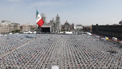 People attend a mass trampoline class in Mexico City, Mexico, 23 October 2022. The Zócalo of the Mexican capital was the setting where the Guinness Record was set for 'The World's Largest Fitness Trampoline Class', when 3,935 participants gathered. After participating during the 30-minute class, the Head of Government of Mexico City, Claudia Sheinbaum stressed that the new Guinness Record shows that Mexico City is the most sporty in the world. EPA / Mario Guzmán