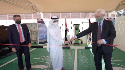 Saeed Al Tayer (centre), Chief Executive of Dubai Electricity and Water Authority (Dewa), and Graham Stuart (right), UK Minister for Exports, inaugurate the electric vehicle charging station at the UK Embassy in Dubai. WAM