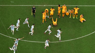 Argentina players celebrate after their win in the penalty shoot-out. Getty
