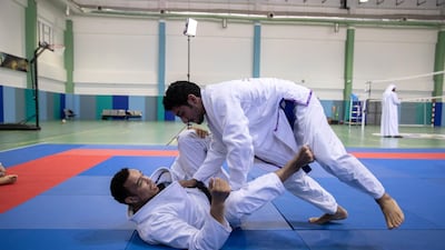 Faisal Al Ketbi, bottom, is one of the UAE national team's leading jiu-jitsustars. Courtesy Action Group
