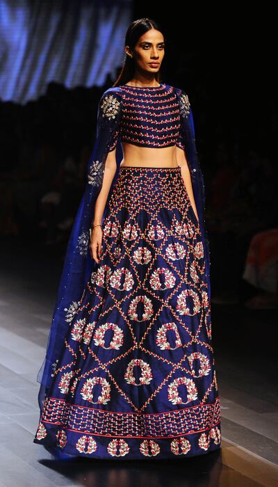 An Indian model showcases creations by designer Nachiket Barve at Lakme Fashion Week (LFW) Winter/Festive 2017 in Mumbai on August 19, 2017.Lakme Fashion Week which took place in Mumbai. AFP