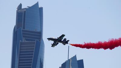 The Al Fursan National Aerobatic Team perform a fly-by. AFP