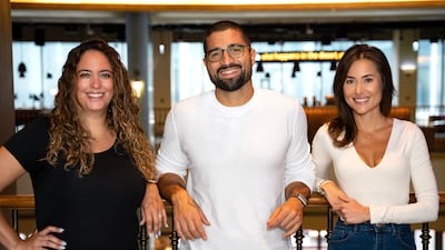 Dina Mohammad-Laity with Yousef Albarqawi and Becky Jefferies, founders of Dubai-based start-up alfii. Photo: alfii