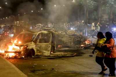 Police vans set on fire in Sale, Morocco. AFP