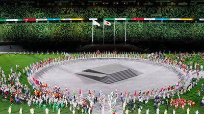Flag bearers of the competing nations enter the stadium during the closing ceremony.