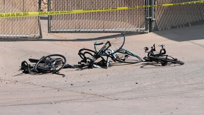 Broken bikes were strewn across the road at the scene of the attack. Authorities have not yet established a motive. AP