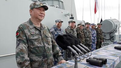 Chinese President Xi Jinping reviewing the Chinese People's Liberation Army Navy fleet in the South China Sea. Li Gang / Xinhua / AP