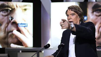 The French tycoon Bernard Tapie takes to airwaves last month to defend himself against a government investigation into his finances. Fred Dufour / AFP