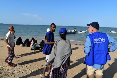 Workers from the International Organisation for Migration receive people fleeing Yemen who came ashore in Obock, Djibouti. Reuters