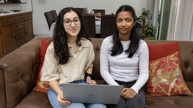 Aliya Arora, 17, left, and Rose Sunil, 18, are disappointed the regional war has led to their CBSE grade 12 final exams being cancelled. Antonie Robertson / The National