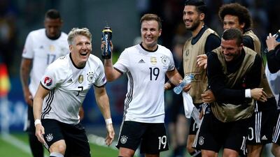 Mario Gotze, centre, whose goal won the 2014 World Cup final, is a firm yoga convert. Laurent Dubrule / EPA