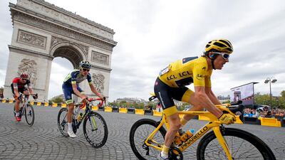 Thomas passes the Arc de Triomphe in the peloton. Reuters