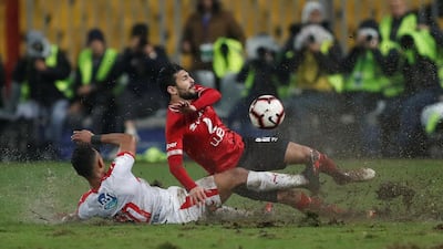 Al Ahly's Ayman Ashraf in action with El Zamalek's Youssef Obama. Reuters