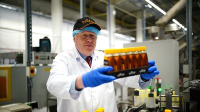 UK Prime Minister Boris Johnson during last week's visit to Hilltop Honey in Newtown, Powys, Wales. PA Images