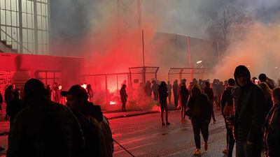 Protesters gather outside the SC Cambuur stadium in Leeuwarden, The Netherlands, after they were not allowed to watch a match due to coronavirus restrictions. EPA