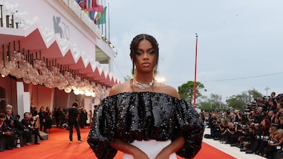 French model Didi Stone, in a black and white off-the-shoulder gown. Getty Images