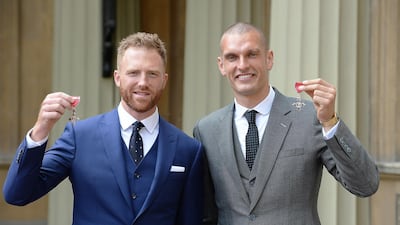 Sbihi and William Satch hold their MBE Medals after receiving them from the Prince of Wales at Buckingham Palace in 2017.