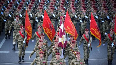 Russian soldiers march towards the Red Square. AP