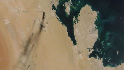 A satellite image provided by NASA Worldview shows fires following drone strikes on two major oil installation owned by the state giant Aramco, in eastern Saudi Arabia, and claimed by the Tehran-backed Huthi rebels in neighbouring Yemen, where a Saudi-led coalition is bogged down in a five-year war. Saudi Arabia raced on September 15, 2019 to restart operations at oil plants hit by drone attacks which slashed its production by half, as Iran dismissed US claims it was behind the assault. The peninsula in the image is Qatar and the island (top) is Bahrain. AFP PHOTO / NASA Worldview