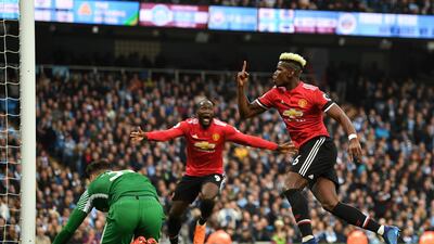 Paul Pogba celebrates scoring his and Manchester United's second goal during the 3-1 victory over Manchester City at the Etihad Stadium. Michael Regan / Getty Images