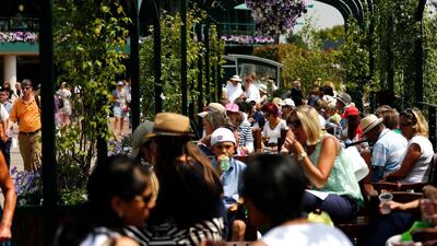 Spectators attend Day 2 of the 2014 Wimbledon Championships at the All England Club on Tuesday in London. Andrew Cowie / AFP / June 24. 2014
