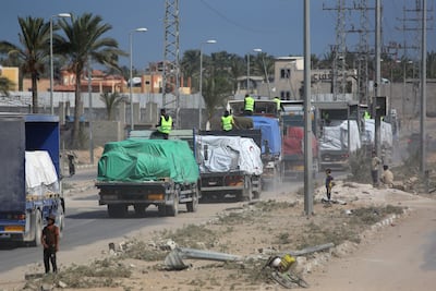 Aid lorries head towards central Gaza after passing through the Karam Abu Salem crossing. AFP