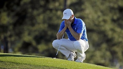 Jordan Spieth on the 18th green after he effectively ended his hopes of a second Masters title in as many years. Chris Carlson / AP Photo