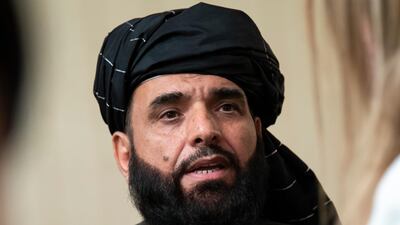In this May 28, 2019, file photo, Suhail Shaheen, spokesman for the Taliban's political office in Doha, speaks to the media in Moscow, Russia. AP